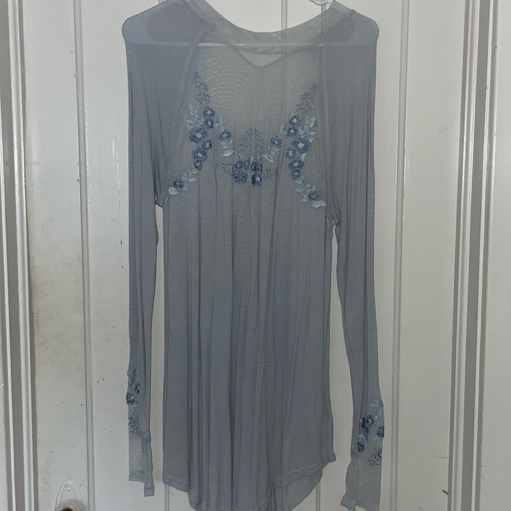 Baby blue long sleeve dress.